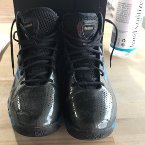 A pair of Reebok zig tech blk and blue